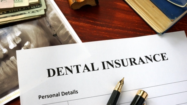 Paper form for dental insurance in Irving