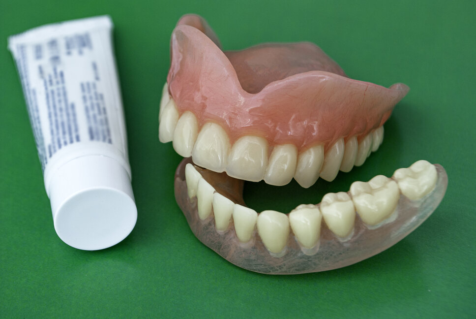 picture of dentures and denture adhesive