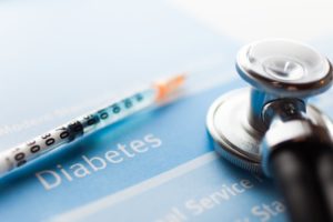a fact sheet about diabetes with a stethoscope on top of it