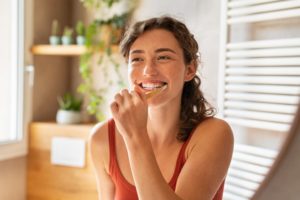 a person brushing their teeth