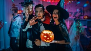 a family dressed up at a Halloween party