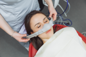 a woman on nitrous oxide in a dental office
